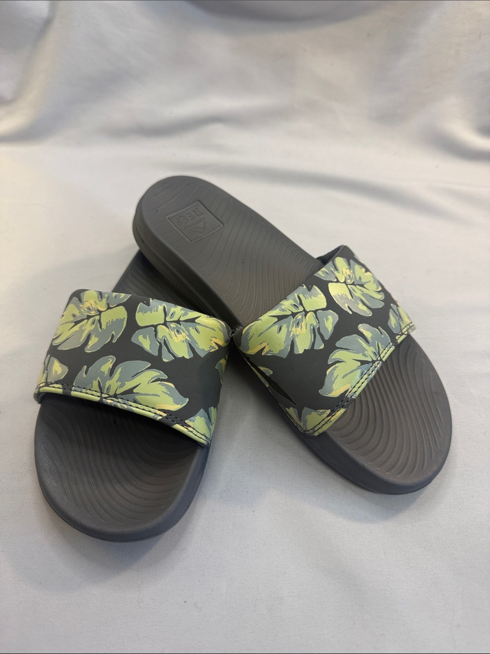 Reef Gray Slide Sandals with Yellow Tropical Leaf Print